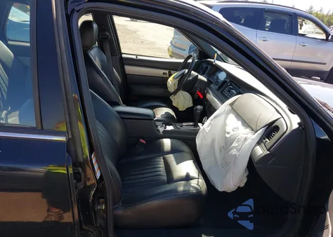 2004 Mercury Marauder z USA, uszkodzony, nr VIN 2MHHM79V44X671663